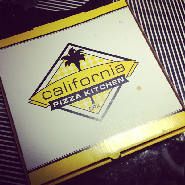 Our food came well-packed. The pizza in the box and my salad in a plastic container neatly wrapped in a brown paper bag.